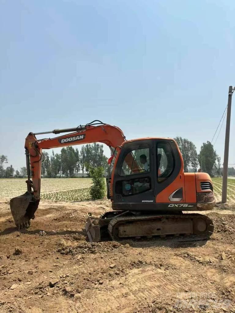 Doosan DX 75-9 Bandgrävare