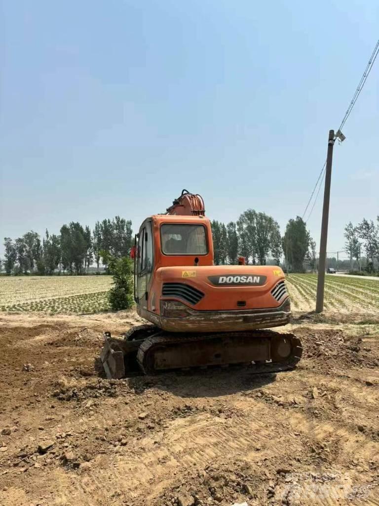 Doosan DX 75-9 Bandgrävare