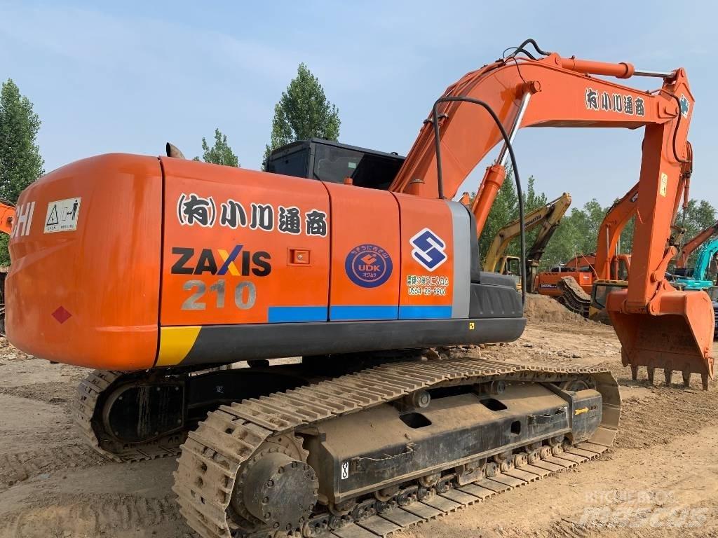 Hitachi ZX210G Bandgrävare