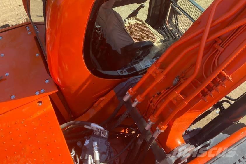 Doosan DX225 Bandgrävare