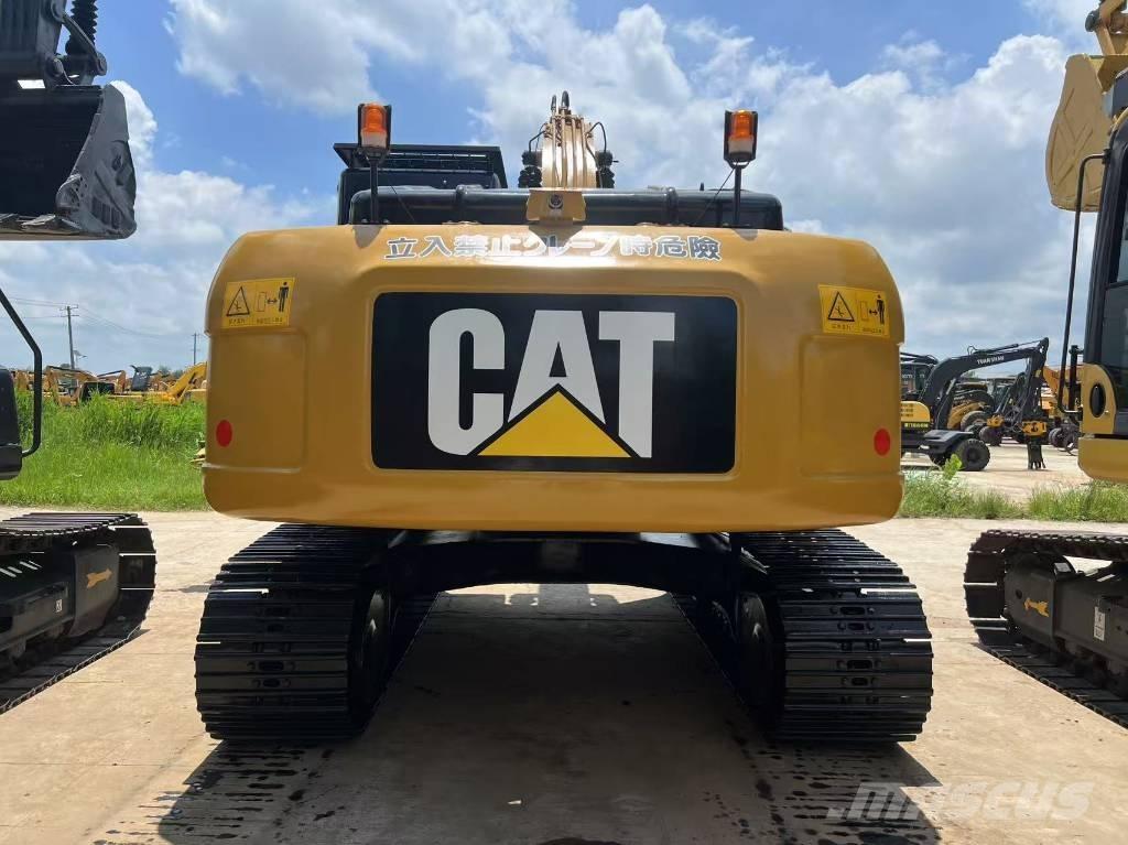 CAT 323 D Bandgrävare