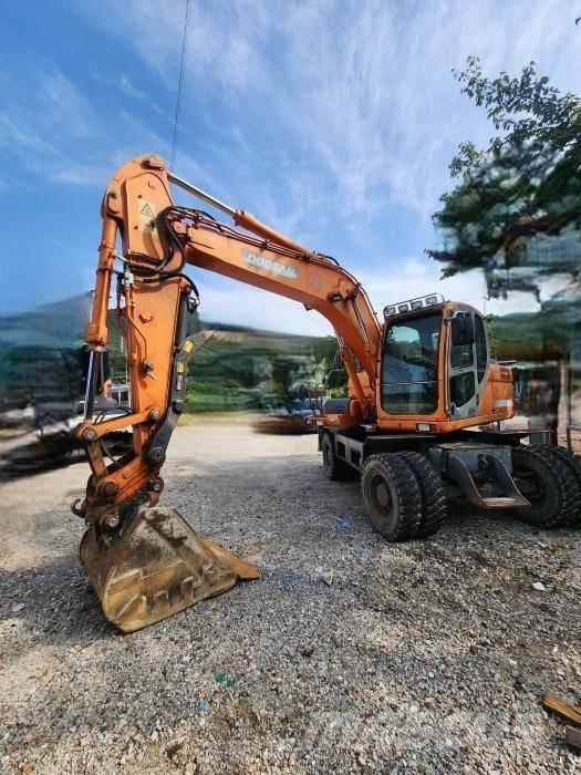 Doosan DX 140 W Hjulgrävare