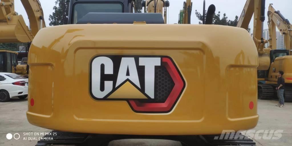 CAT 2021 CAT 313D2GC Hjulgrävare