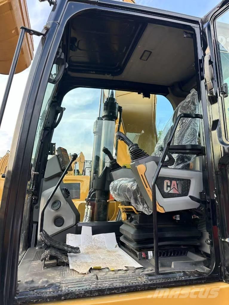 CAT 323 Bandgrävare