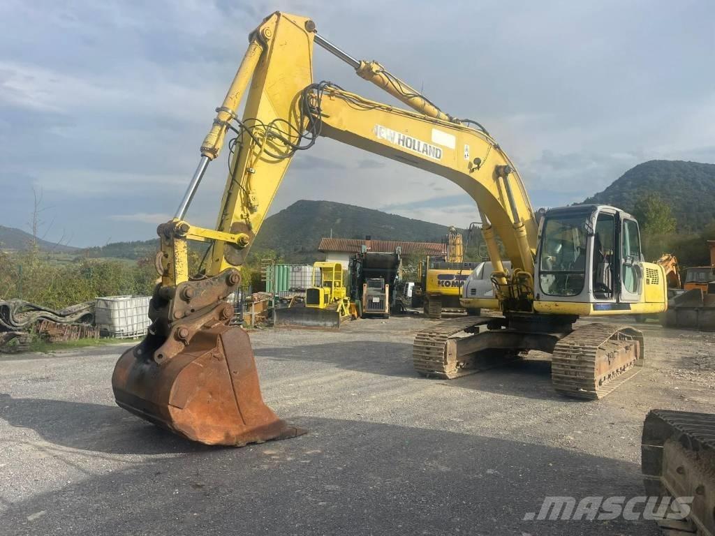 New Holland E 305 Bandgrävare