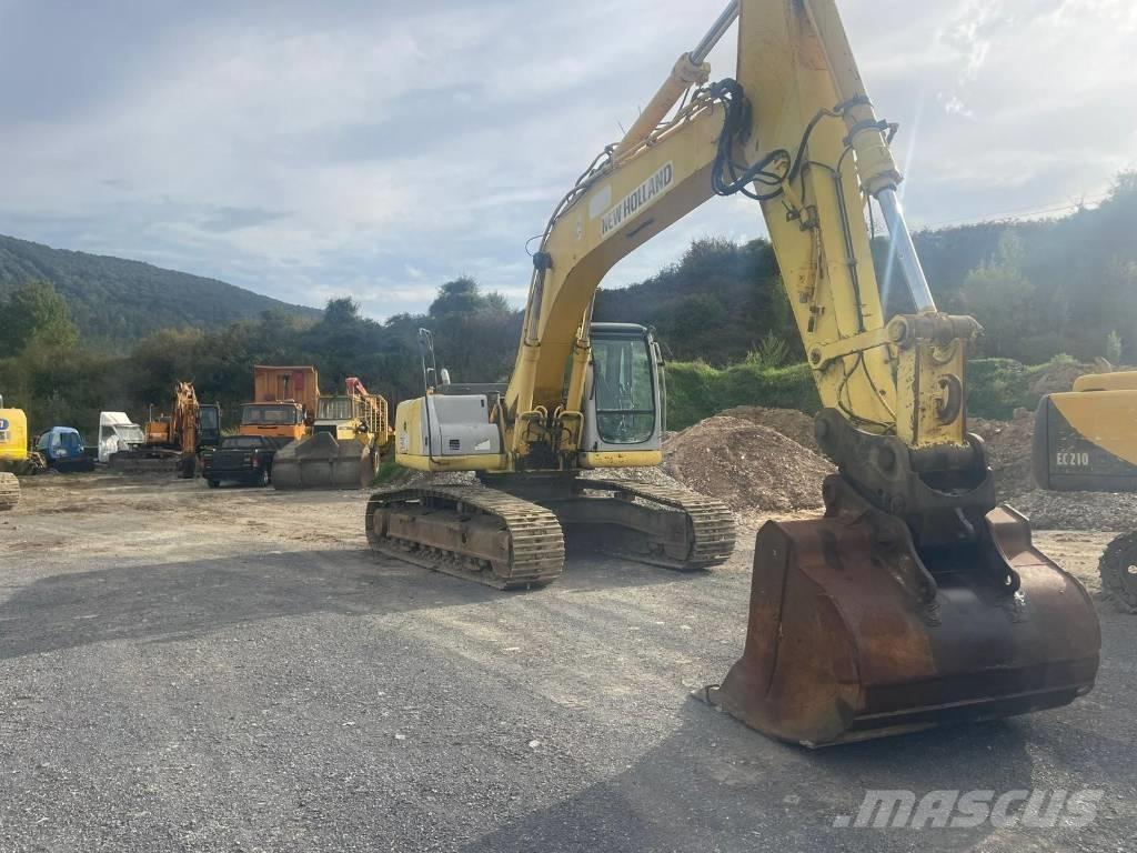 New Holland E 305 Bandgrävare