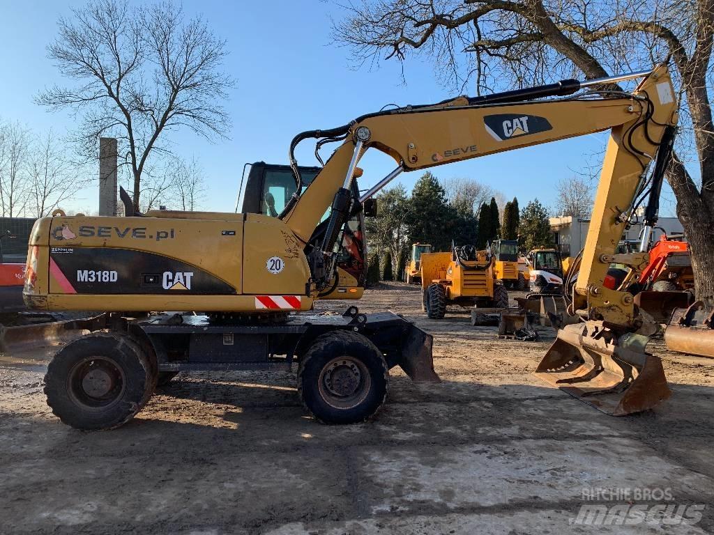 CAT M 318 D Hjulgrävare
