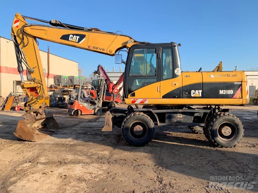 CAT M 318 D Hjulgrävare