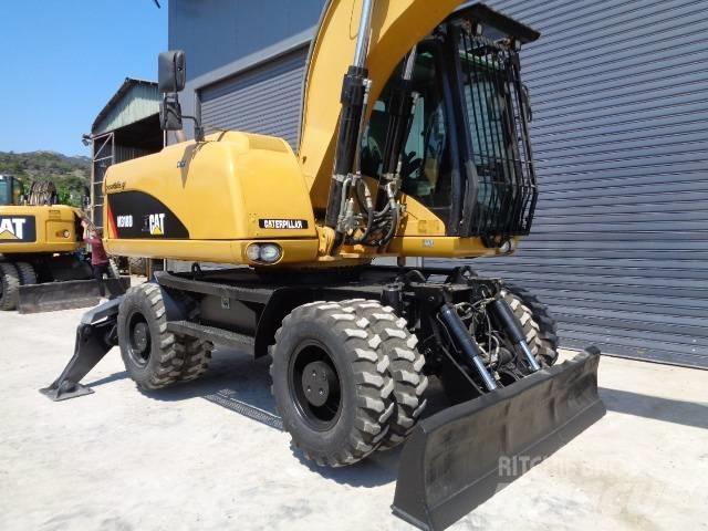 CAT M 318 D Hjulgrävare