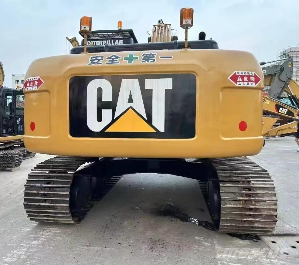 CAT 323 D Bandgrävare