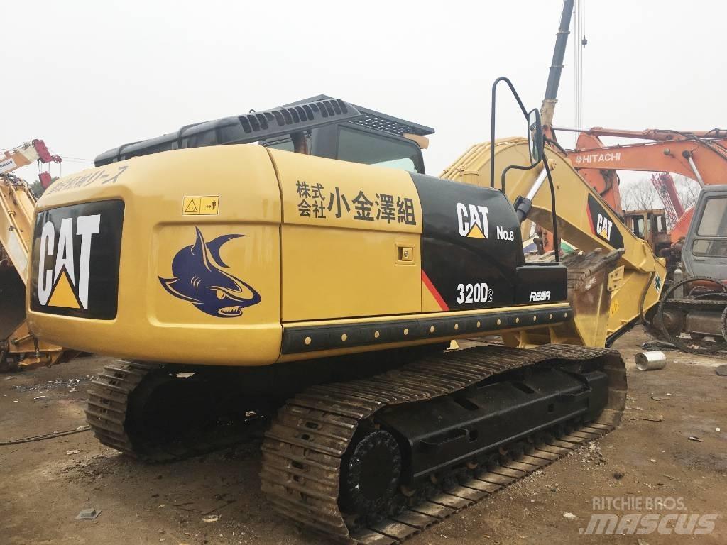 CAT 320 DL Bandgrävare