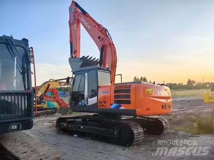 Hitachi ZX210 Bandgrävare