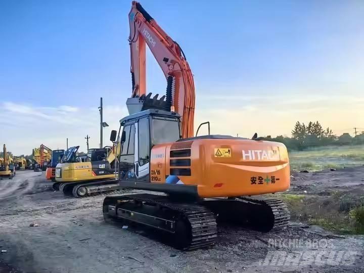Hitachi ZX210 Bandgrävare