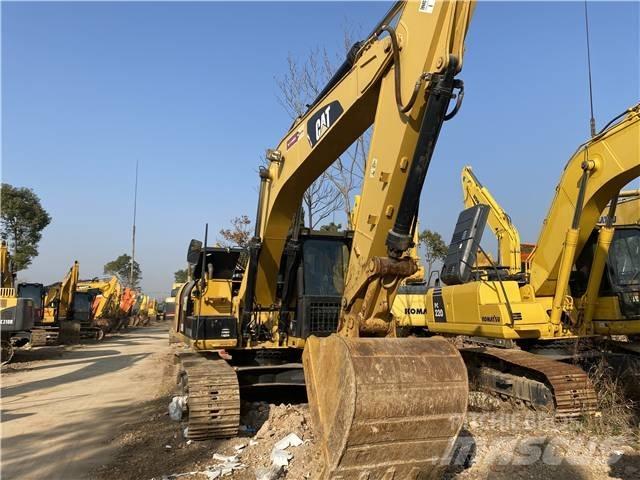 CAT 318D Bandgrävare