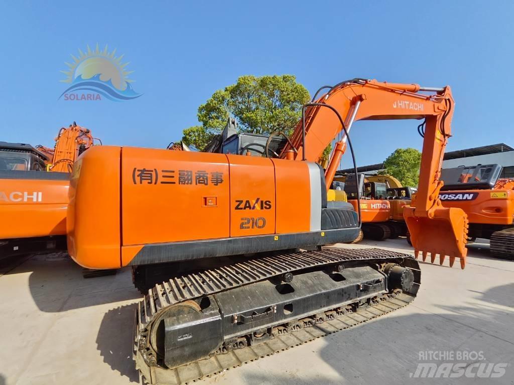 Hitachi ZX 210 Bandgrävare