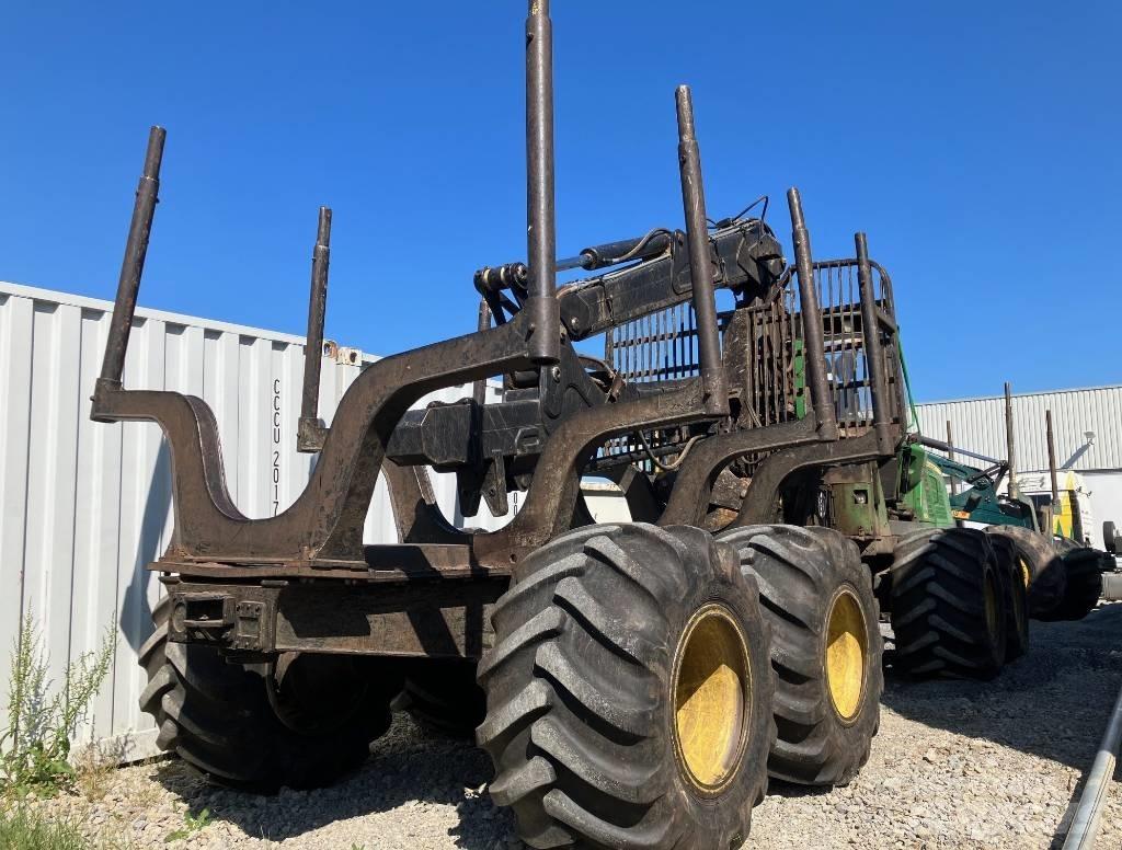 John Deere 1110 E Skotare