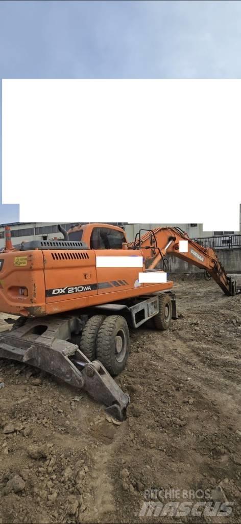 Doosan DX 210 W Hjulgrävare