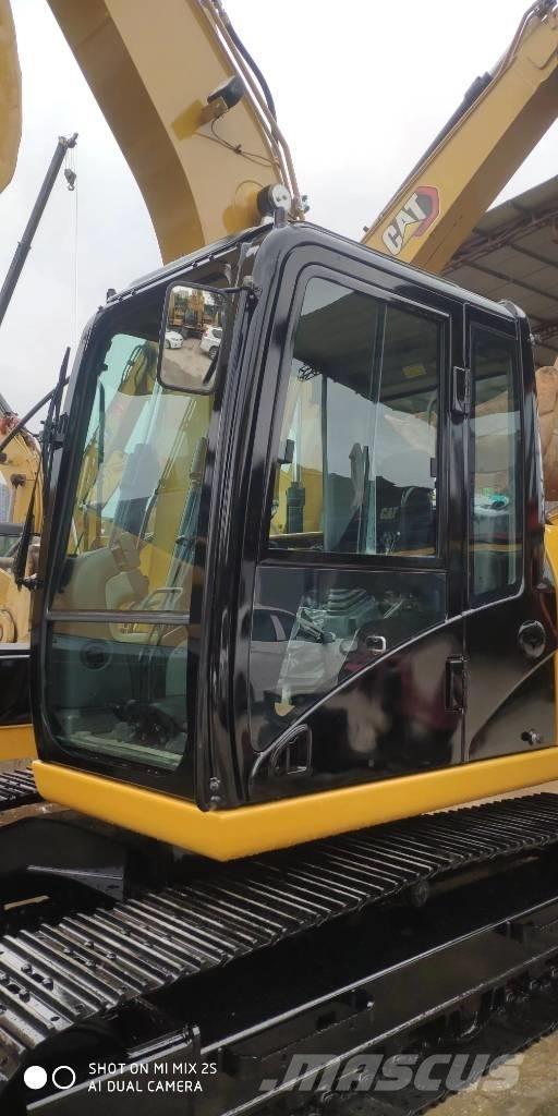 CAT 2021 CAT 313D2GC Hjulgrävare