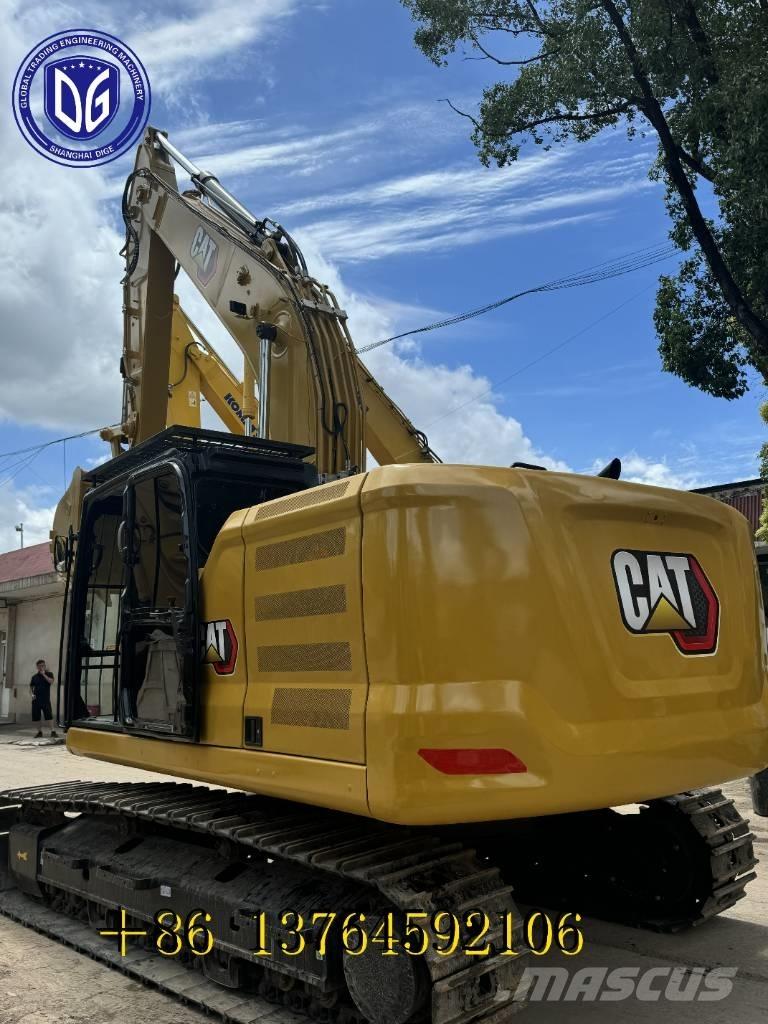 CAT 323 Bandgrävare