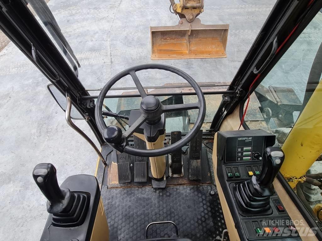 CAT M 312 Hjulgrävare
