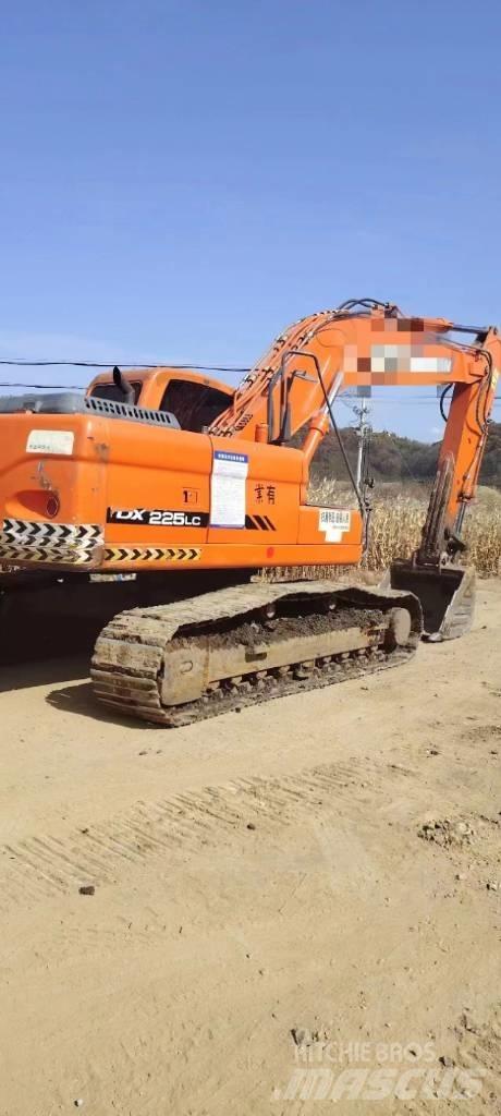 Doosan DX 225LC Bandgrävare