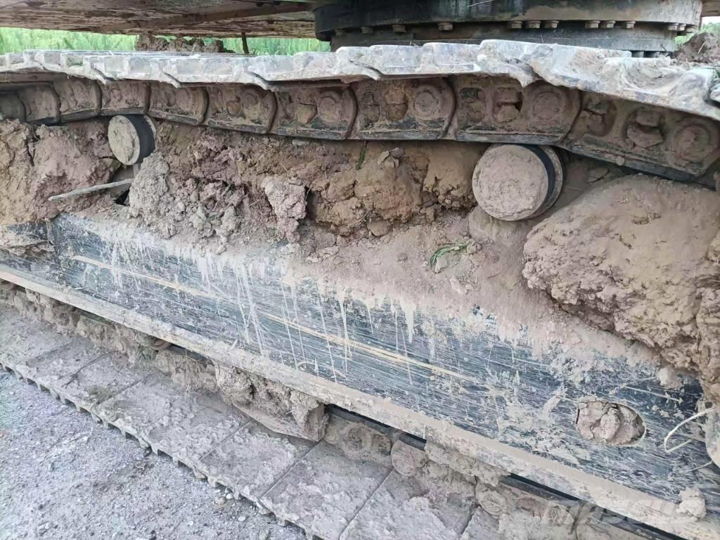 CAT 323GX Amfibiska grävmaskiner