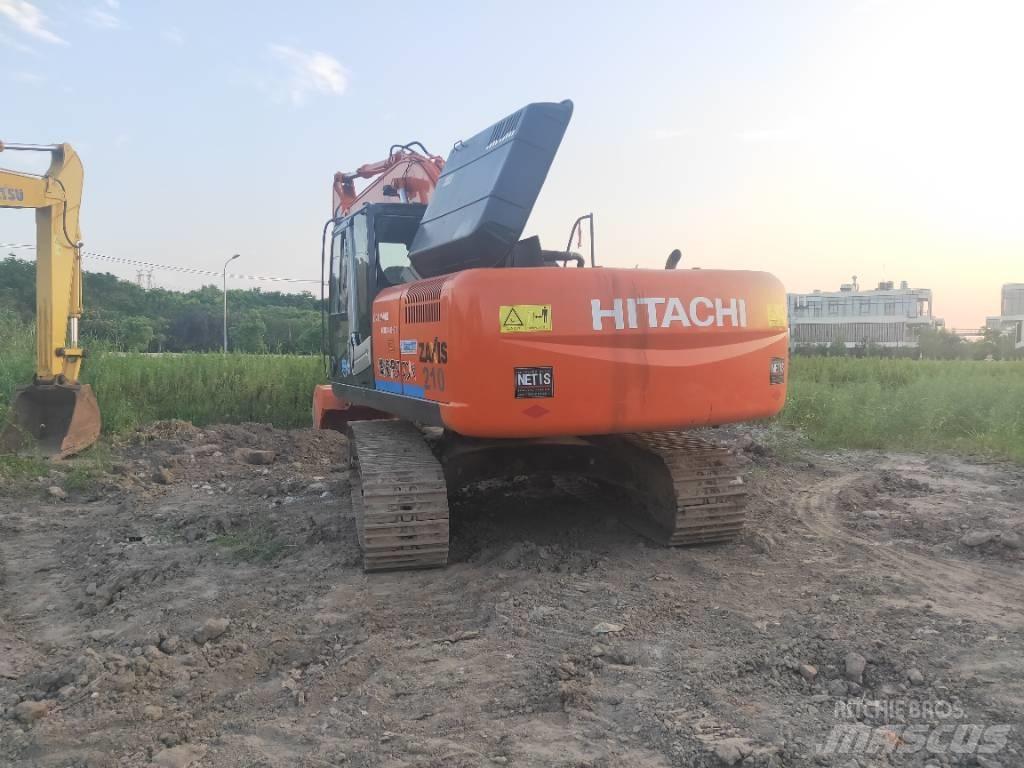 Hitachi ZX 210 Bandgrävare