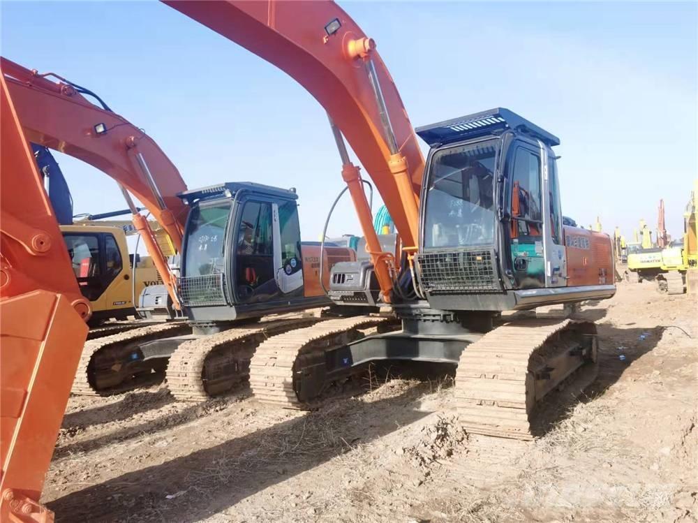 Hitachi ZX210 Bandgrävare