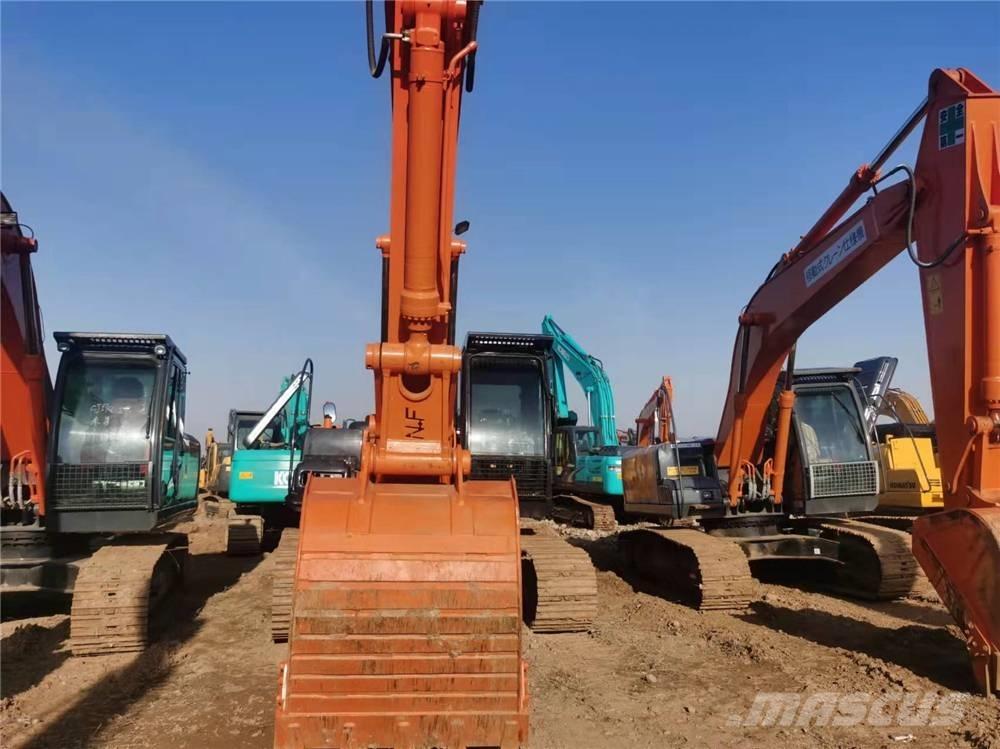 Hitachi ZX210 Bandgrävare