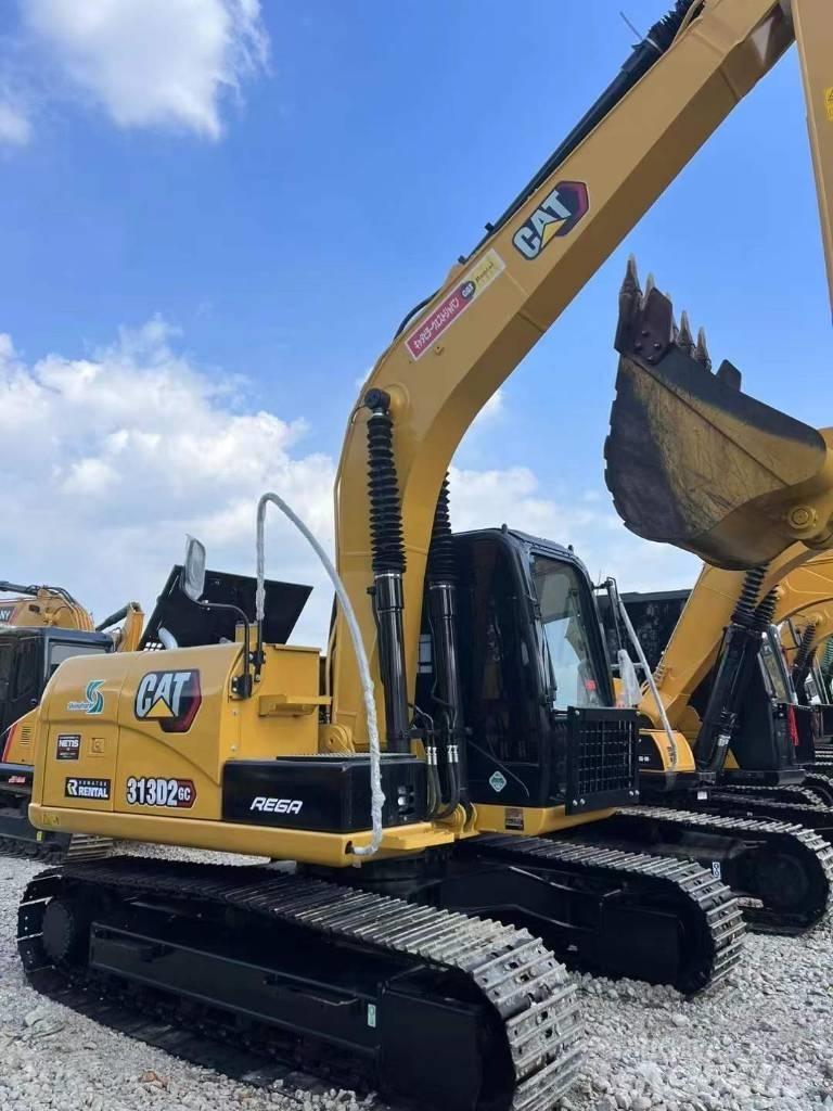 CAT 313 D Bandgrävare
