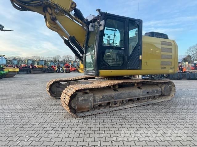 CAT 323 EL Bandgrävare