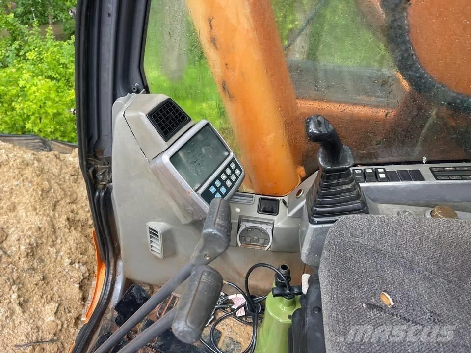 Doosan DX 255 LC Bandgrävare