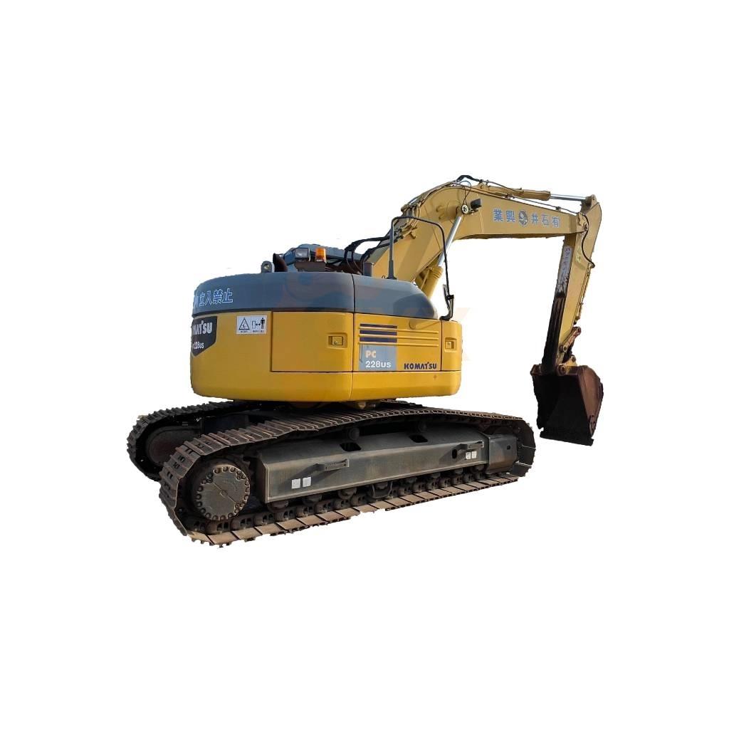 Komatsu PC 228 US Bandgrävare