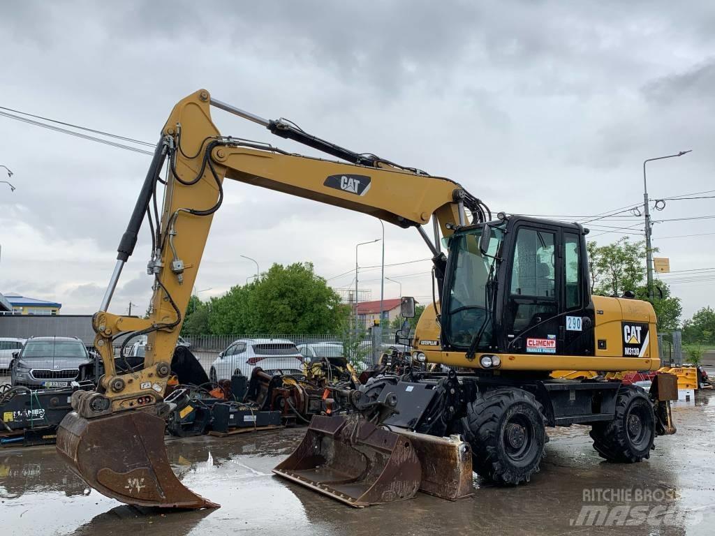 CAT M 313 D Hjulgrävare