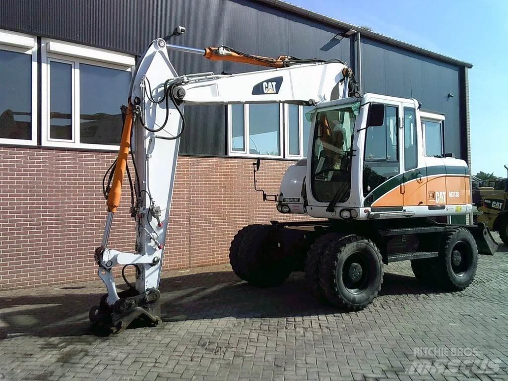 CAT M313D Hjulgrävare