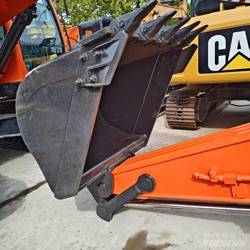 Doosan DX 225 Bandgrävare