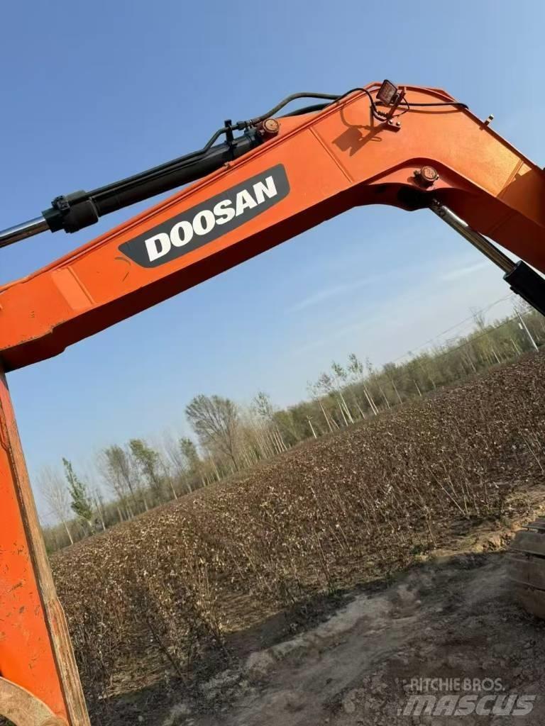 Doosan DX 75-9 C Bandgrävare