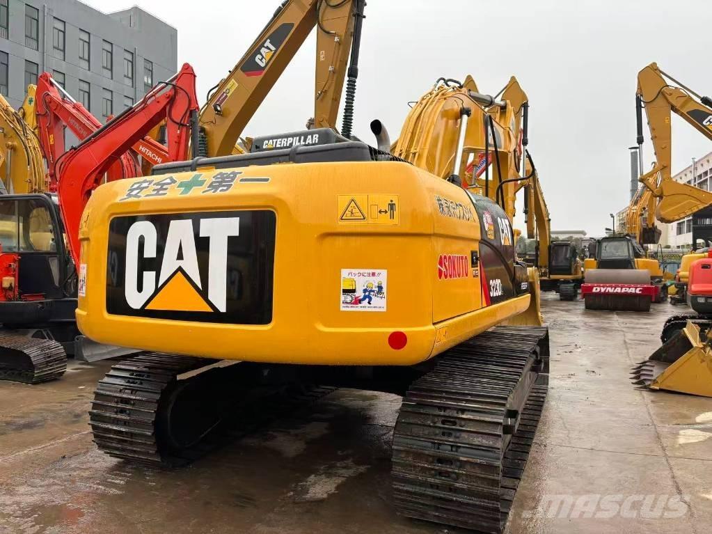 CAT 323 D Bandgrävare
