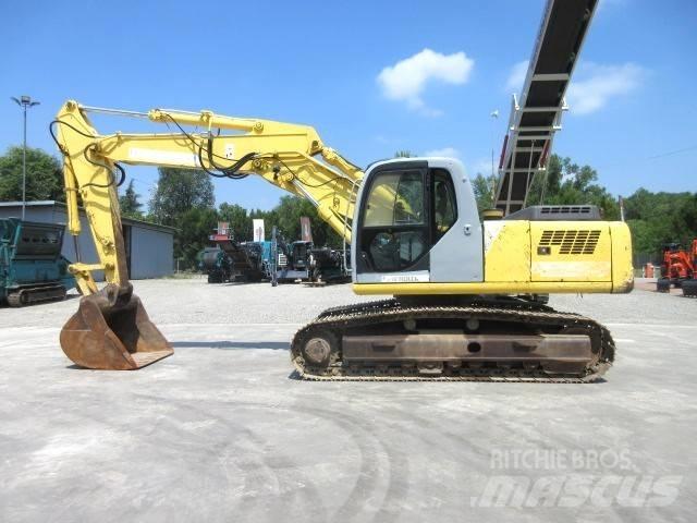 New Holland E 245 Bandgrävare