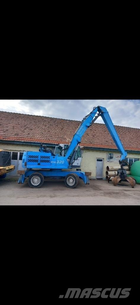 Fuchs MHL 320 Hjulgrävare