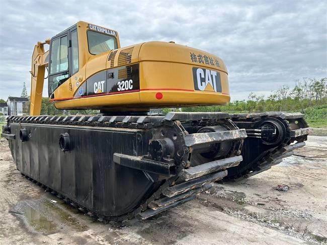 CAT 320 C Amfibiska grävmaskiner