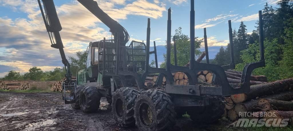 John Deere 1110 E Skotare