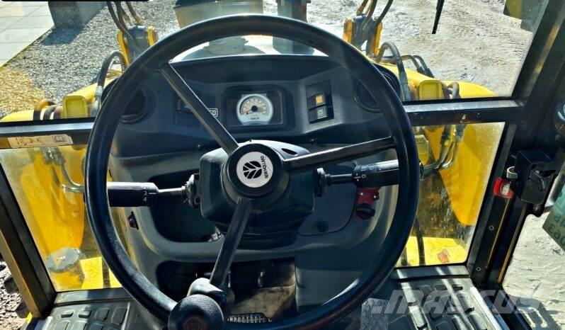 New Holland B 115 Grävlastare