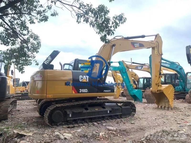 CAT 318DL Bandgrävare