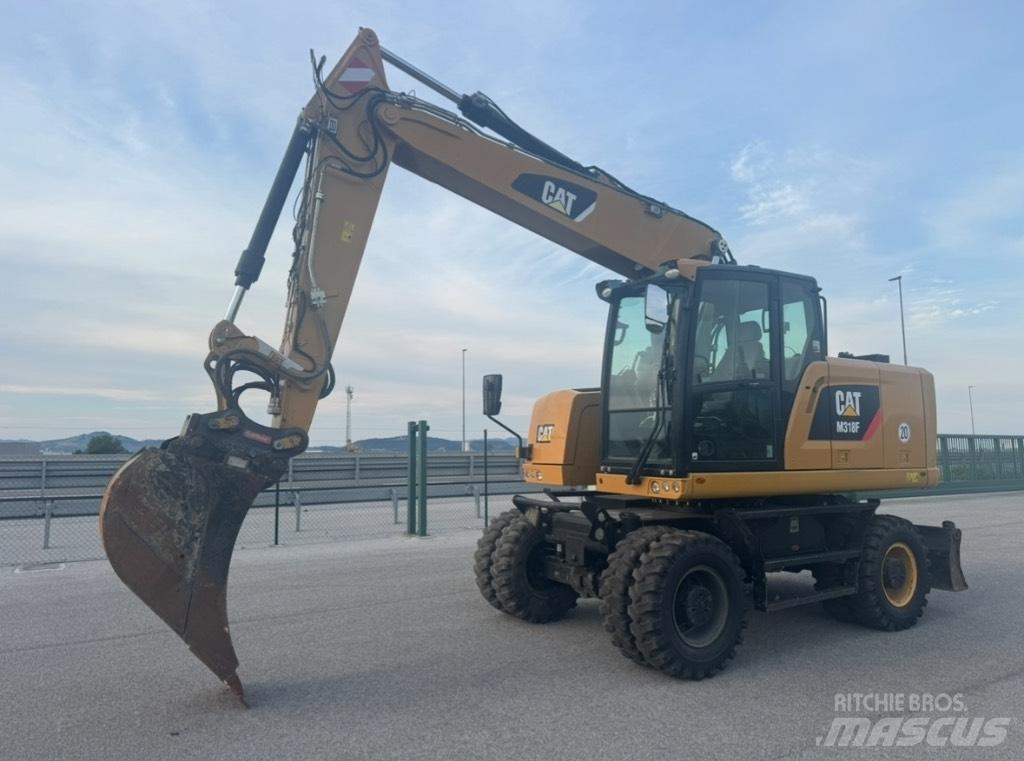 CAT M 318 F Hjulgrävare
