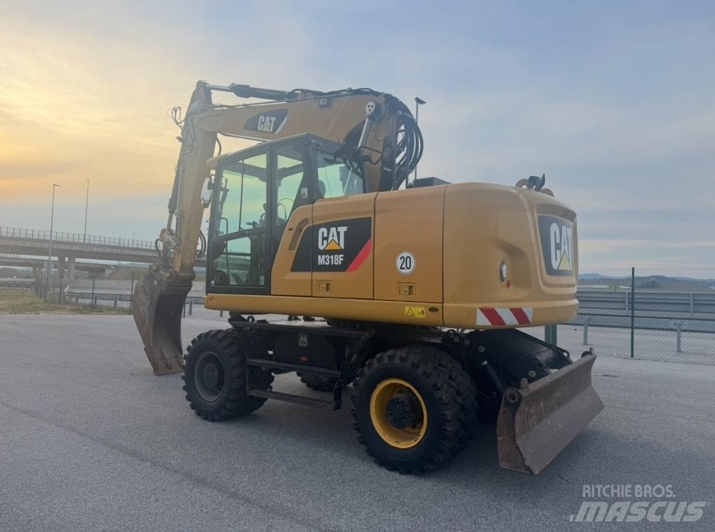 CAT M 318 F Hjulgrävare