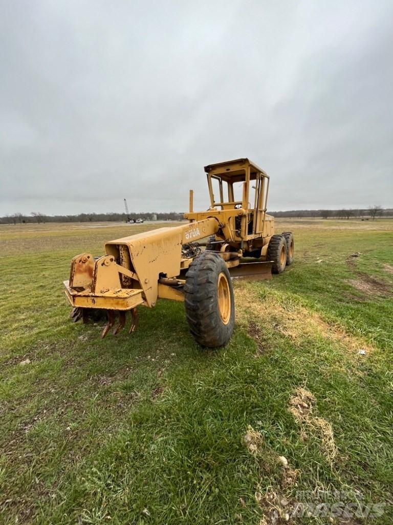 DEERE 570A Väghyvlar