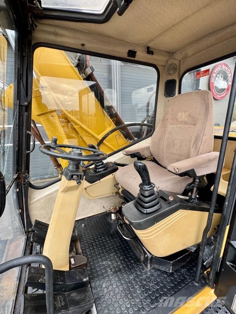 CAT M 318 Hjulgrävare