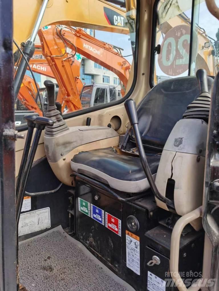 CAT 303 Minigrävare < 7t