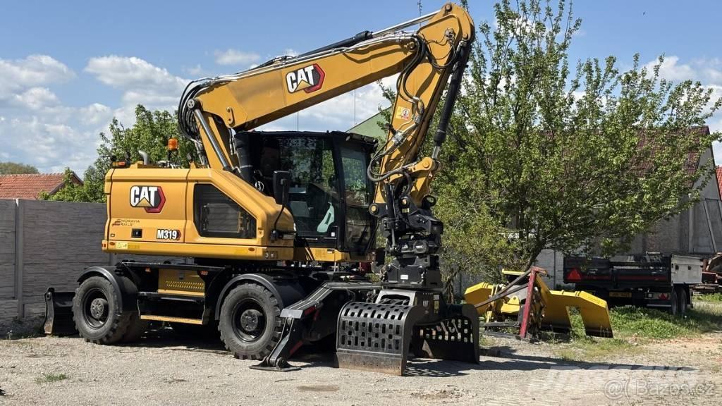CAT M 319 Hjulgrävare